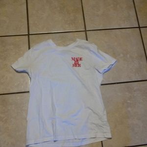 White top that says made by her